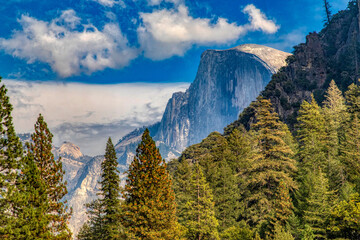 Yosemite half dome with mountain ridge