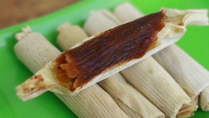Dodol Garut wrapped in corn husks.. Made of sticky rice flour, palm sugar, coconut milk and grated...