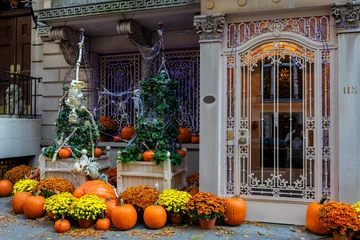Foto op Canvas Colorful Pumpkins and Flowers on the Stairs of an Old Brownstone Home in New York City during Autumn. High quality photo © Ekaterina