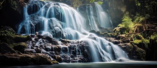 Foto op Plexiglas Background of complete blurriness with two waterfalls © 2rogan