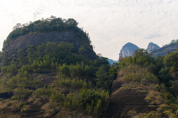 Scenic picture of the tall strange shaped rocks in Wuyishan Scenic area, China