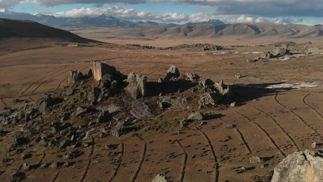 Aerial view with a drone, with afternoon light of a geologic phenomenon known as stone forest in the highlands of the Andes, in the area of Conococha, Ancash, Peru.