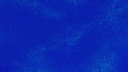 Particles background. Defocused glitter. Underwater flow. White glowing shimmer swirl spreading in blue aquatic water in creative bokeh liquid abstract art.