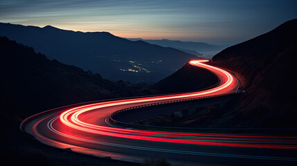 Car brake taillights light trail blur winding around a curvy mountain road - obrazy, fototapety, plakaty