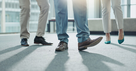Business people, legs and team standing at office in meeting, interview or waiting room. Closeup of corporate employees, formal shoes or feet in teamwork for hiring, recruiting or growth at workplace - obrazy, fototapety, plakaty