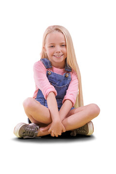 Portrait, fashion and smile of child cross legged, sit on floor and isolated on a transparent png background. Happy, young blonde girl in clothes and style, trendy or cute and adorable in Switzerland