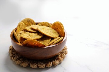 Crispy and crunchy methi mathri is a popular tea time snack in north India. It's especially popular during the Diwali festive season. It's a savory cracker or Masala puri. Copy Space.