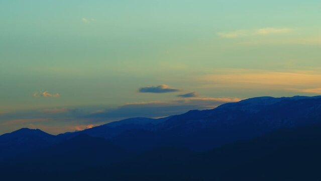 Colorful Sunrise Over Mystic Mountains In Wild Nature. Clouds In Mountains At Sunrise. Timelapse.