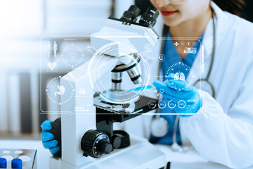 Female scientist researcher conducting an experiment working in chemical laboratory.