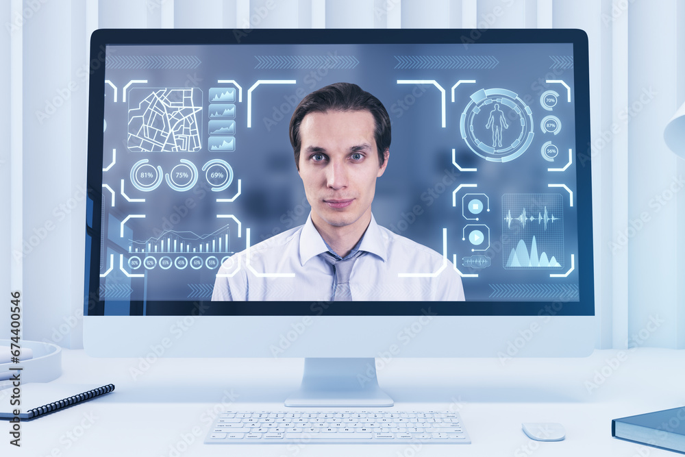 Poster close up of computer monitor with portrait of attractive pensive businessman with glowing face recog