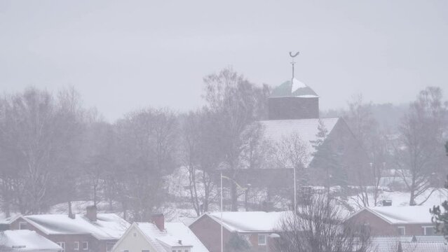 Small Town Villas and Church in Sweden at Winter with Heavy Snowfall