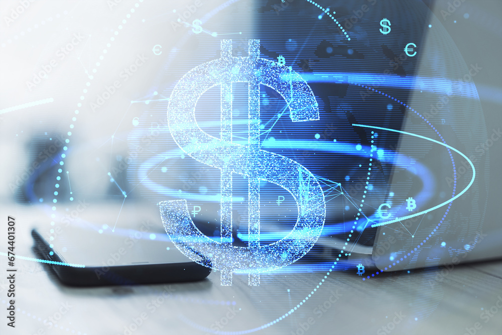 Poster close up of laptop computer and smartphone on desk with glowing digital blue dollar hologram on blur