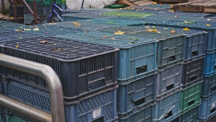 Wooden and Plastic Empty Vegetables Crates at Closed Market Stand
