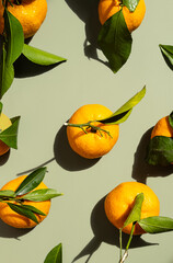 Tangerines flat lay. Citrus fruits background.