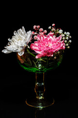 pink rose in glass