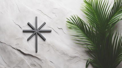 Fototapeta na wymiar Beautiful Vintage crucifix cross with palm leaves on dark stone background .