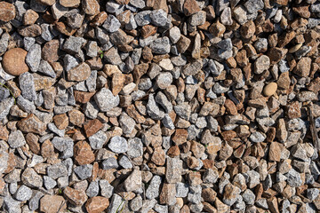ballast, textured background small stones of a railway track, ballast