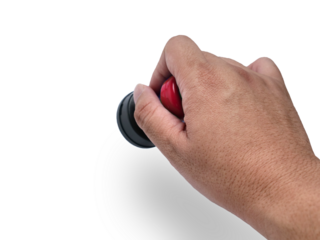 Hand holding red handled round rubber stamp, top view isolated on white