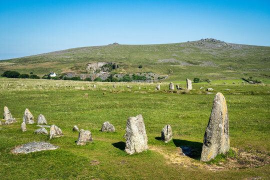 A stone row, one of several Bronze Age monuments around Merrivale on Dartmoor, near Tavistock, Devon, with Great Staple Tor in the background.