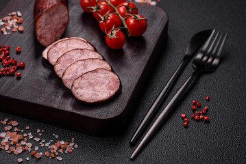 Delicious smoked sausage with salt and spices cut into slices