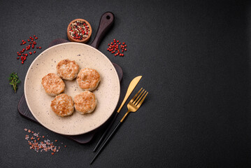 Fried meatballs of minced meat beef, pork or chicken with salt, spices and herbs
