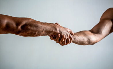 Friendly handshake, friends greeting, teamwork, friendship. Rescue, helping gesture or hands. Two hands, helping arm of a friend, teamwork. Helping hand outstretched, isolated arm, salvation - obrazy, fototapety, plakaty