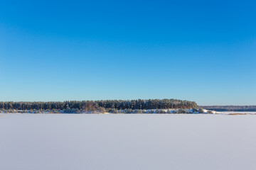 Frozen lake with ice and snow