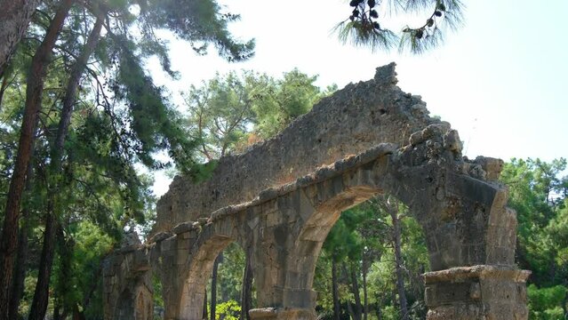 Antique ruins mediterrenean old city phaselis Turkey. Phaselis or Faselis was a Greek and Roman city on the coast of ancient Lycia. Its ruins are located north of the modern town Tekirova