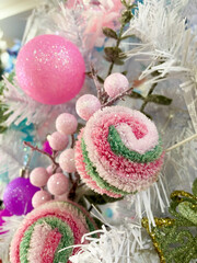 Christmas decorations on a white tree