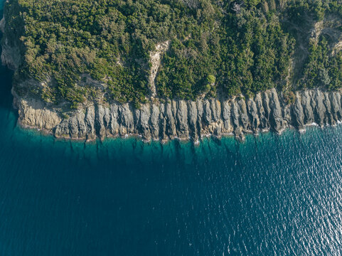 Aerial view of Vivara Island rugged coasline on Procida Island, view of the Natural reserve, Flegree islands archipelagos, Naples, Campania, Italy.