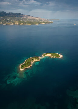 Aerial view of Ksamil islands, Albania, with Corfu island in background.