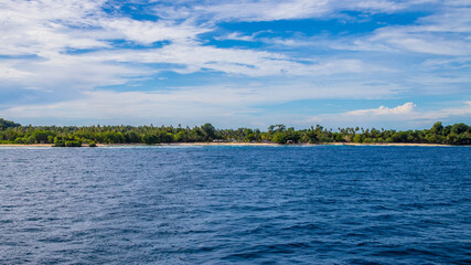 Beach with sea and blue sky