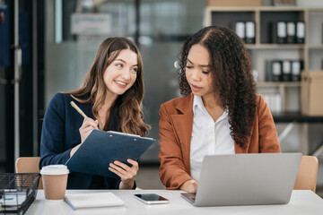 Two Young businesswoman discuss with new startup project Idea presentation.