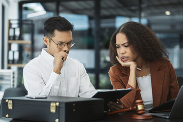 Teamwork of business lawyer meeting working hard about legal legislation.