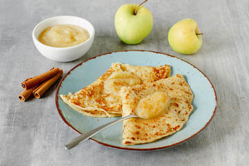 Vegan crepes with apple sauce and cinnamon, healthy food for children