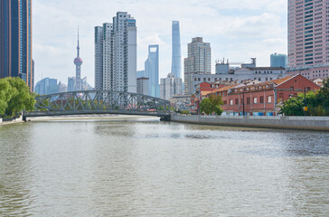 Fototapeta na wymiar financial buildings by the river in Shanghai, China