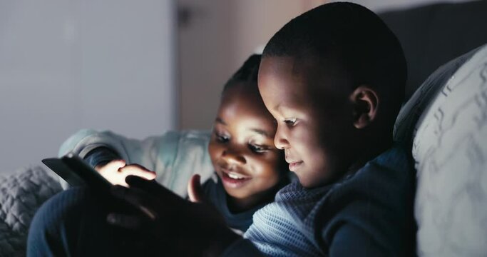 Black children, happy and tablet in home bedroom, bonding and smile together. African kids, tech and scroll in bed, streaming movie, film and video, social media or game, learning and typing at night