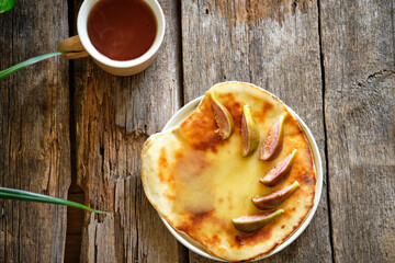 Homemade flatbread with honey and figs.