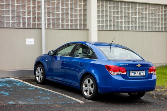 Blue Chevrolet Cruze LT sedan parked in Iceland
