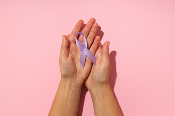 Purple ribbon, concept for the day of elimination of violence against women.