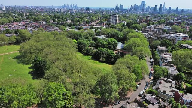 London, England: Aerial view of capital city of UK, Highbury Fields Park in Islington on sunny summer day - landscape panorama of United Kingdom from above