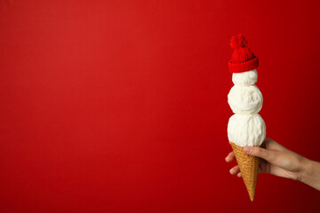 A waffle cone with a decorative snowman