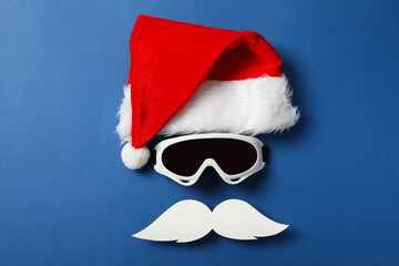 Santa Claus with a mustache and ski goggles
