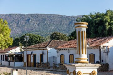 Historic square in the center of Tiradentes with Serra Sao Jose and fog in the background, state of Minas Gerais, Brazil