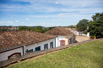 Fototapeta na wymiar Colonial houses in the historic city of Tiradentes, old houses on a stone street, route of the Estrada Real de Minas Gerais, Brazil