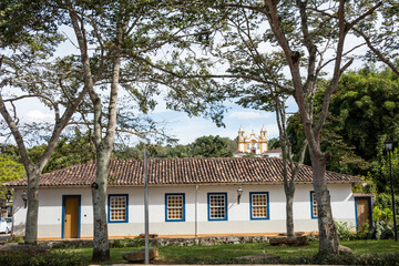 Colonial house in the city of Tiradentes in Minas Gerais with mountains in the background