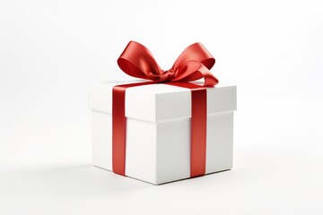 Obraz premium White Gift Box with Red Ribbon on White Background