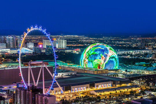 The Sphere opened September 2023, Exosphere is nightly used to display art and advertising.Aerial View of Skyline, Strip at Night, Neon Lights..Las Vegas, Nevada , United States of America