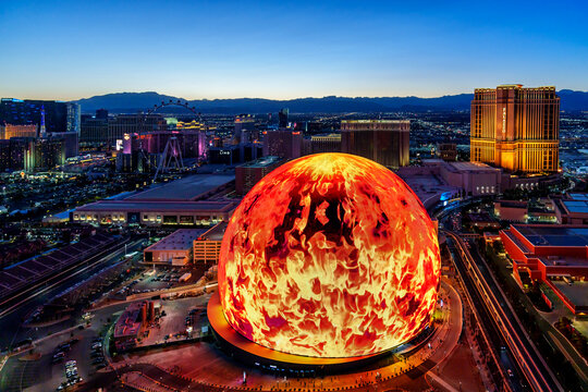 The Sphere opened September 2023, Exosphere is nightly used to display art and advertising.Aerial View of Skyline, Strip at Night, Neon Lights..Las Vegas, Nevada , United States of America
