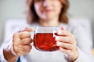 Young woman having morning tea